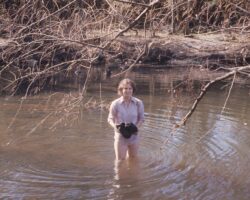 Diane pulling coral heads out of the river.