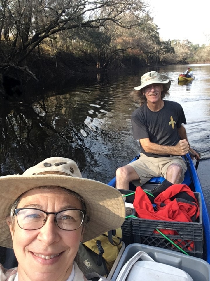 Julie and Jon with George in the background looking for new agatized coral sites.